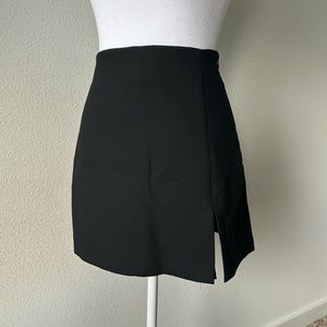 Black front slit mini skort